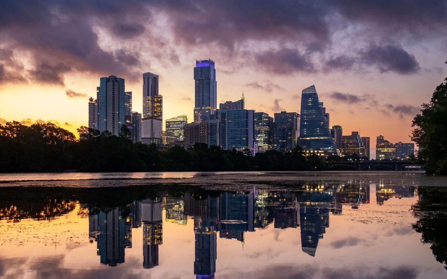 Reflection of tall buildings on water